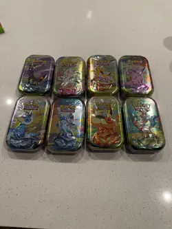 Pokemon Prismatic Evolutions Mini Tin Bundle x8 Full Set Tins NEW/SEALED - Image 1