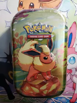 Pokemon TCG Prismatic Evolutions Mini Tin Flareon New Sealed - Image 1