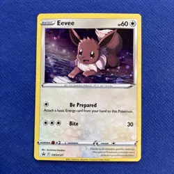 Eevee 2021 Black Star Promo Cosmos Holo Pokemon Card SWSH127 (NM) - Image 1