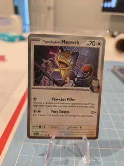 Team Rocket's Meowth 149/182 Cosmos Holo Promo Pokemon Card - Image 1