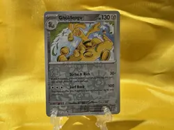 Gholdengo #131/191 SV Surging Sparks 2024 Reverse Holo and Base card Pokemon TCG - Image 2