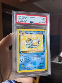 PSA 9 1st Edition Vaporeon Rare 28/64 Jungle Pokemon Card 1999 WOTC Eeveelution - Image 1
