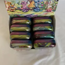 Pokemon TCG Prismatic Evolutions Set Of 8 Sealed Mini Tins W Open Display Box - Image 5