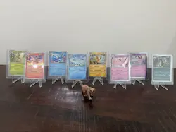 7x Pokemon 8 Cosmo Promo Cards from Costco Prismatic Evolutions Mini Tin Bundle - Image 1