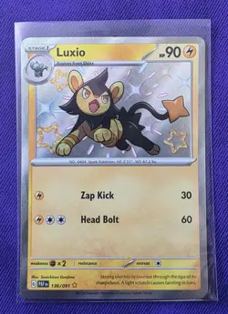 Paldean Fates Baby Shiny LUXIO 136/091 Pokemon TCG Holo - Image 1