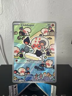 Pokemon Clobbopus Illustration Rare Card 207/191 Surging Sparks - Image 1
