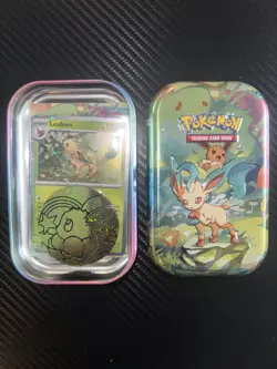 Umbreon Mini Tin Prismatic Evolutions + Matching Cosmo Foil, Art Card, And Coin. - Image 1