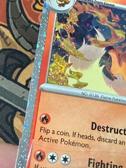 Flareon 013/131 Cosmos Holo Prismatic Evolutions SWIRL (B) POKEMON - Image 3