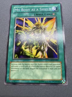 Yu-Gi-Oh! My Body As A Shield Rare Unlimited TU02-EN007 HP DAMAGED - Image 1
