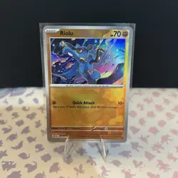 Pokemon Prismatic Evolutions TCG Riolu Pokeball Reverse Holo Card 050/131 - Image 1