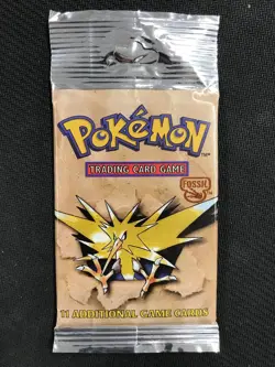 Pokemon Unopened Fossil Booster Pack 11 Cards Factory Sealed 1999 (1 Pack) - Image 1