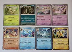 Pokemon TCG Prismatic Evolutions Set Of 8 Cosmo Promo Cards. Costco Mini Tin Set - Image 1