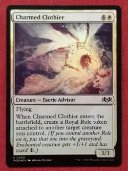 Magic The Gathering WILDS OF ELDRAINE FOIL CHARMED CLOTHIER white card MTG - Image 1