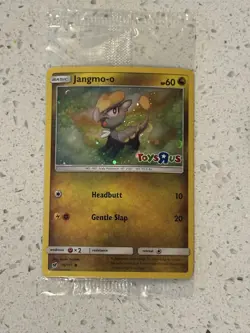 Jangmo-o 75/111 Toys R Us Cosmos Holo Stamped Promo Sealed Pokemon TCG Card - Image 1