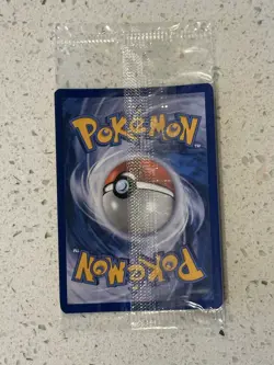 Jangmo-o 75/111 Toys R Us Cosmos Holo Stamped Promo Sealed Pokemon TCG Card - Image 2