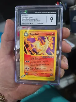 2002 Rapidash Pokemon Card Black Star Promos 51 Pokemon Center NY CGC 9 - Image 1