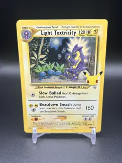Light Toxtricity SWSH137 SWSH: Celebrations Holo Black Star Promo Card - Image 1