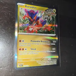 Koraidon 119/162 Gamestop Stamped Promo Cosmos Holo Pokemon TCG NM/MINT - Image 1
