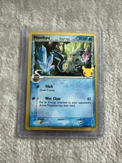 Pokemon Card Mimikyu SWSH136 Delta Species 25th Celebrations Black Star Promo - Image 1