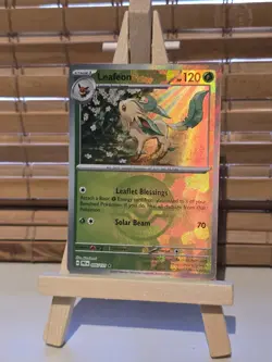 Pokemon TCG: Leafeon Pokeball Reverse Holo - Prismatic Evolutions 005/131 - NM - Image 1