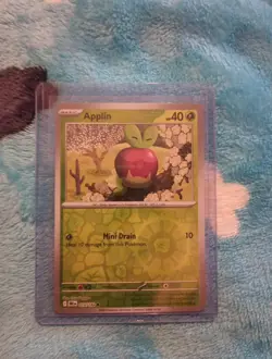 2025 Baslc Applin Reverse Holo Pokemon Training Card Game - Image 1