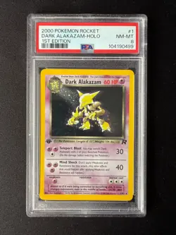 1/82 Dark Alakazam 1st Edition PSA 8 Holo Team Rocket Base Pokemon Card WOTC - Image 1