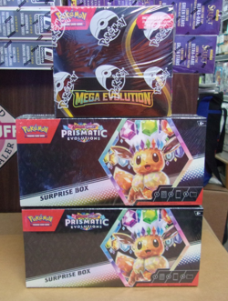 POKEMON PRISMATIC EVOLUTIONS (2) SURPRISE + MEGA EVOLUTION BOOSTER BOX LOT - Image 1