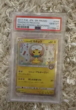 Tohoku's Pikachu PSA10 - 88/SMP Sm Holo Pokemon card - Image 1