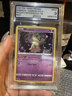 2020 Pokemon SWSH Mighty Mysterious Tin Mimikyu Holo Cosmos W/HD Swirl AGS 9 - Image 1