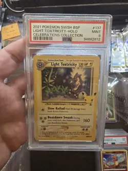 Light Toxtricity SWSH137 PSA 9 Promo Celebrations Pokemon Cards Graded - Image 1