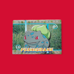 BULBASAUR (FUSHIGIDANE)--JAPANESE MEIJI EMBOSSED PROMO FOIL POKEMON CARD - Image 1