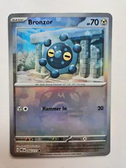 Pokemon TCG Evolutions Reverse Holo Masterball Card - 066/131 Prismatic Bronzor - Image 1
