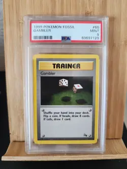 Pokemon 1999 Fossil Gambler Card - PSA 9 - Image 1