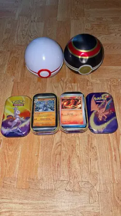 Pokemon Card Lot With 100 Cards, Tins, And Poke balls - Image 1