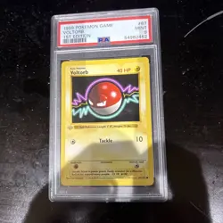 1999 Pokemon Base Set 1st Edition Voltorb #67 PSA 9 - Image 1