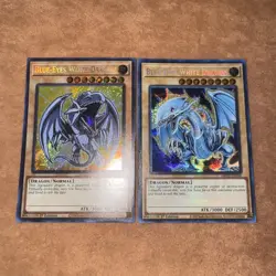 🔥 2x YUGIOH Blue-Eyes White Dragon MP22-EN266 BLMM-EN001 CHIBI ART SECRET RARE - Image 1