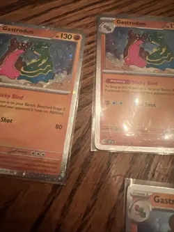 Pokemon Surging Sparks Gastrodon Rare Cosmos Holo Card 107/191 - Image 2