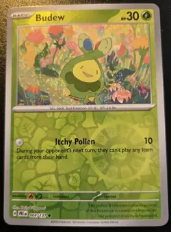 Budew 004/131 Reverse Holo Common Scarlet & Violet: Prismatic Evolutions Pokemon - Image 1