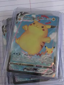 Pokemon Surfing Pikachu VMAX Celebrations Holo Ultra Rare Card 009/025 NM/M - Image 1
