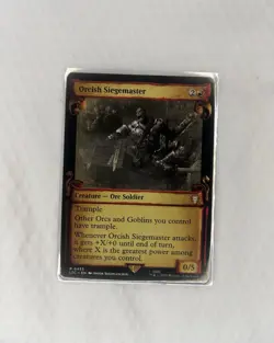 Orcish Siegemaster (Showcase Scrolls) Commander: the Lord of the Rings: Regular - Image 1