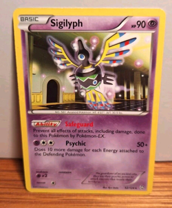 POKEMON SIGILYPH 52/124 NON-HOLO RARE DRAGONS EXALTED LP - Image 1