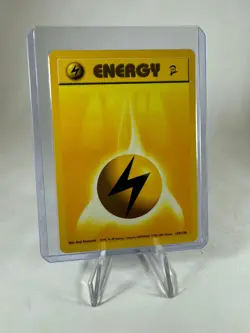 Lighting Energy 128/130 Base Set 2 Pokemon Card 2000 NM-Mint Never Played - Image 1