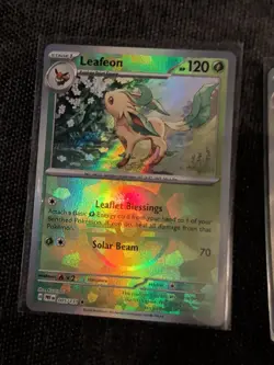 Pokemon TCG Leafeon 005/131 Prismatic Evolutions Poke Ball Reverse Holo NM - Image 1