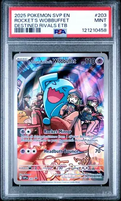 2025 POKEMON SVP DESTINED RIVALS ETB PROMO #203 TEAM ROCKET'S WOBBUFFET PSA 9 - Image 1