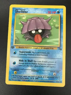 Shellder 1st Edition 54/62 Fossil Common Pokemon Vintage Card WOTC NM 1999 - Image 1
