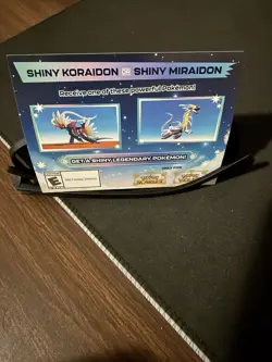 Shiny Koraidon Or Miraidon Pokemon Scarlet Violet Code Card - Gamestop - Image 1
