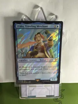 O'aka, Traveling Merchant (Surge Foil) Commander: Final Fantasy Foil - Image 1