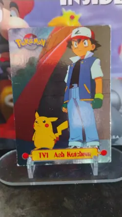 TV1 ASH KETCHUM Nintendo POKEMON Holo Foil 1999 TOPPS Trading Card - Image 1