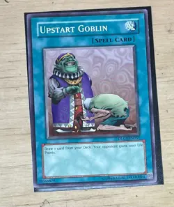 Upstart Goblin - DLG1-EN057 - Common - Unlimited YuGiOh MP - Image 1