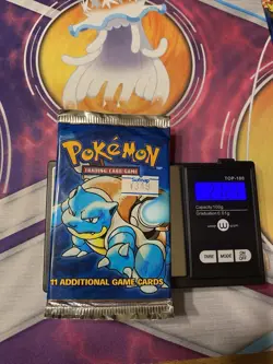 Pokemon Base Set Booster Pack Unlimited Weighed 21.27g - Image 1